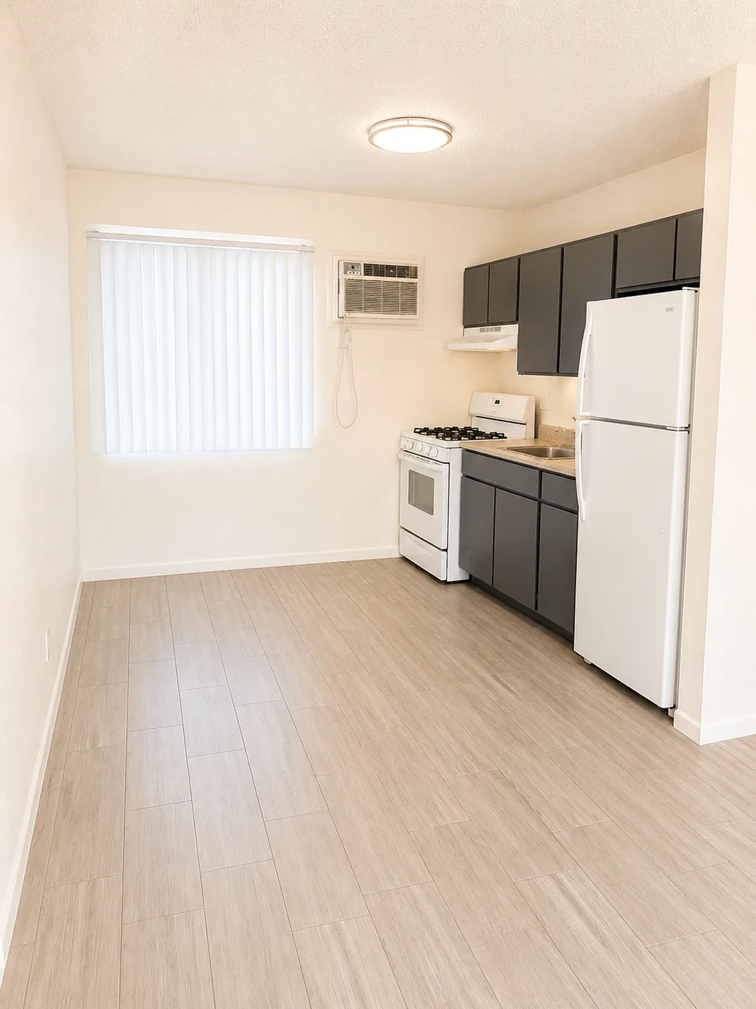Kitchen; furnishings and finishes vary by apartment